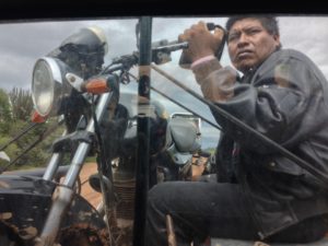 We picked up a passenger on the way out. He helped us get more weight in the back of the truck, and we helped him not have to stop every 15 minutes to get the caked-on mud out of his wheel-well. 