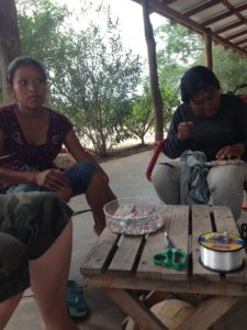 We beaded necklaces, too. This is the woman with her other daughter that came for the visit.